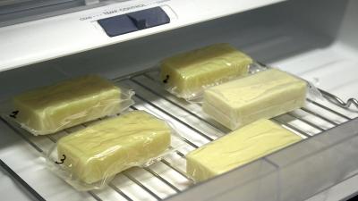 Milk-protein film used as a packaging for blocks of cheese. Photo: American Chemical Society