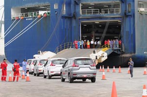 Mitsubishi export  vehicles on mass scale