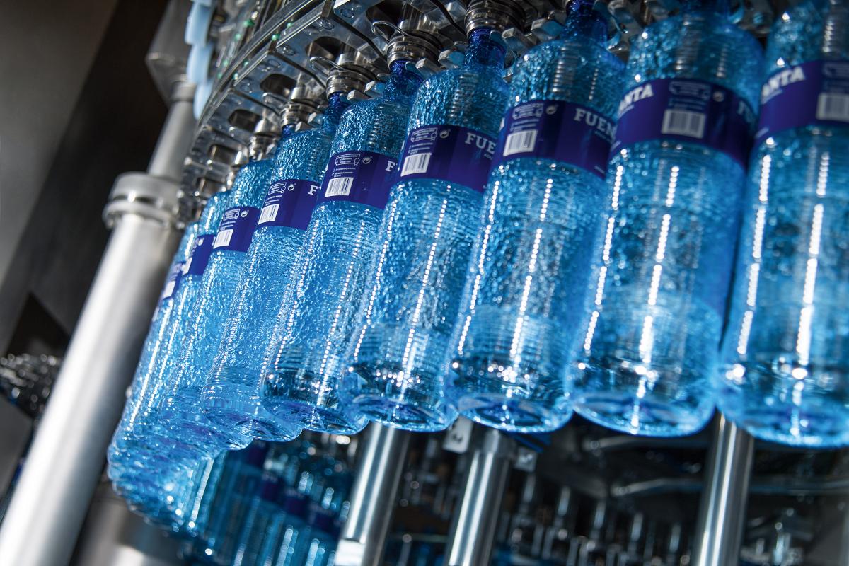 Water filling using Krones filler - the line handles 21,000 bottles an hour 