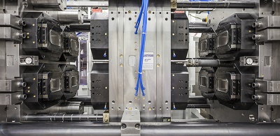 Netstal launches world's first injection compression molding on stack molds