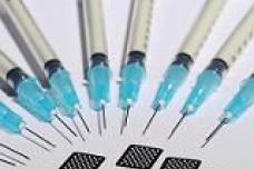 Measles vaccine delivered using microneedle patch