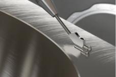 Testing workpiece surfaces in machine tools