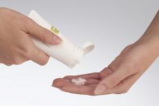 Airless dispensing for medicated creams