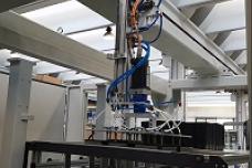 Stacking robots aid thermoforming machines