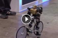 PRIMER-V2 robot rides a bike just like a man