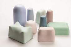Plug-assist materials for thermoforming