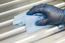 Highly absorbent wipes for tasks in critical processing areas
