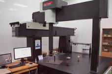 Substrate mastered scale on a CMM