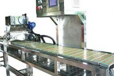 Computerised quantitative filling machine