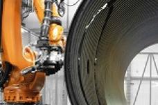 Robot mills oversized plastic pipes